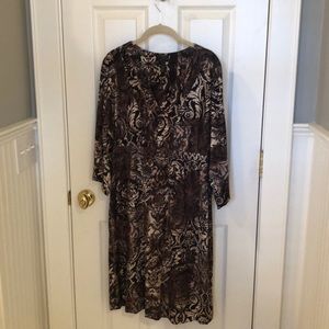 Black with a neutral tone pattern dress